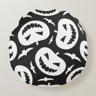 White halloween pumpkins and bats isolated on blac round cushion