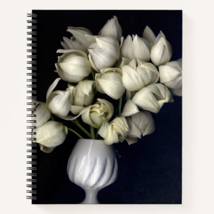 White heart in black notebook