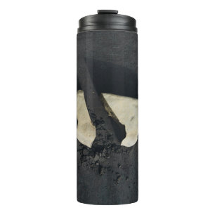 White heart shaped on black surface thermal tumbler
