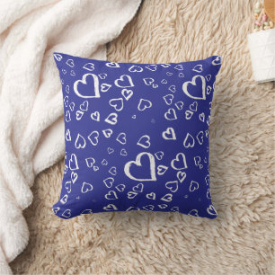 White hearts on blue cushion
