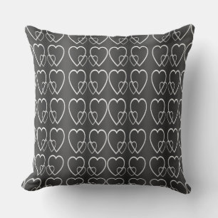 White hearts on grey cushion
