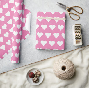 White hearts on pastel pink background wrapping paper