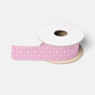 White hearts on pink satin ribbon for wrapping