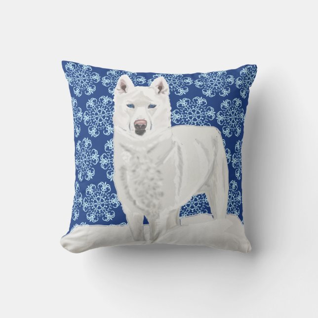White Husky against Snow Flakes and dark blue sky. Cushion (Front)