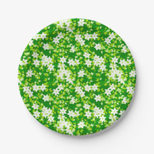 White jasmine among green leaves paper plate