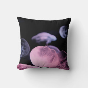 WHITE JELLYFISH IN WATER WITH BLACK BACKGROUND CUSHION