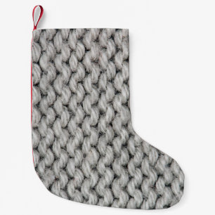 White knitted wool texture, close-up photo. small christmas stocking