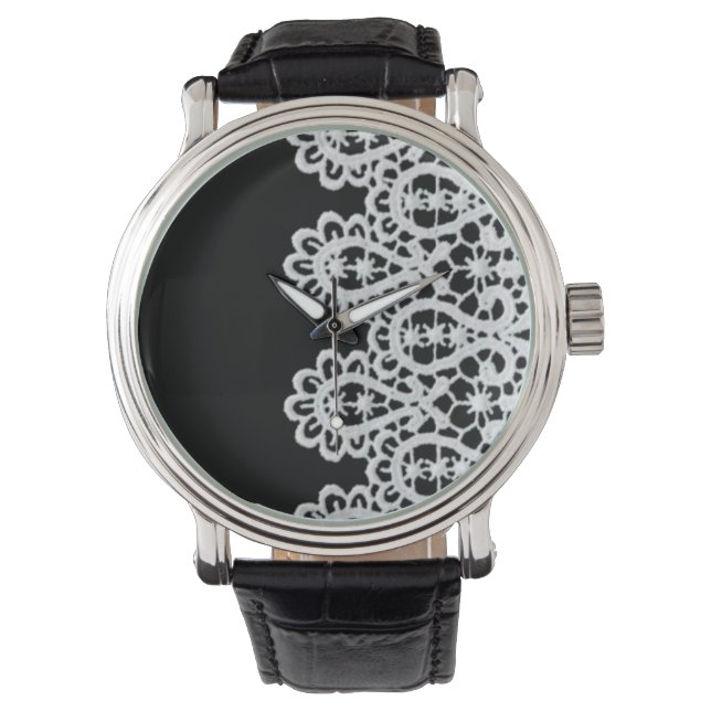 White lace forms a delicate border against black watch (Front)