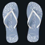 White Lace on Dusty Blue Elegant Bride's Wedding Thongs<br><div class="desc">Dance the night away with these beautiful wedding flip flops. Designed for the bride, they feature a simple yet elegant design with fancy script lettering on a dusty blue background and white lace curls and swirls. Beautiful way to stay fancy and appropriate while giving your feet a break after a...</div>