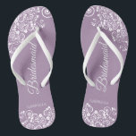 White Lace on Dusty Purple Bridesmaid Wedding Thongs<br><div class="desc">These beautiful wedding flip flops are a great way to thank and recognise your bridesmaids while saving their feet at the same time. Features an elegant design with white floral lace filigree on a dusty purple, lilac, or lavender coloured background. The elegant script lettering reads Bridesmaid with her name below....</div>