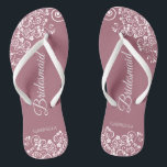 White Lace on Dusty Rose Bridesmaid Wedding Thongs<br><div class="desc">These beautiful wedding flip flops are a great way to thank and recognise your bridesmaids while saving their feet at the same time. Features a simple yet elegant design with white floral lace filigree on a dusty rose or mauve pink coloured background. The elegant script lettering reads Bridesmaid with her...</div>