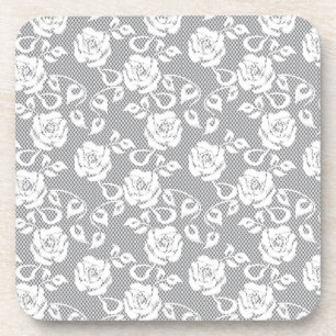 White lace pattern on grey background coaster