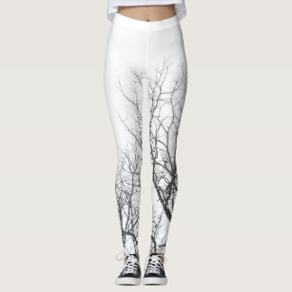 White leggings with tree branches.