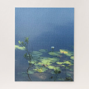 White Lily Flower on Blue Water Jigsaw Puzzle
