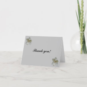 White Magnolia flower on blank Thank You card