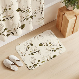 White Magnolia Grove on Cream Bath Mat