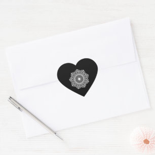 White mandala on black background heart sticker