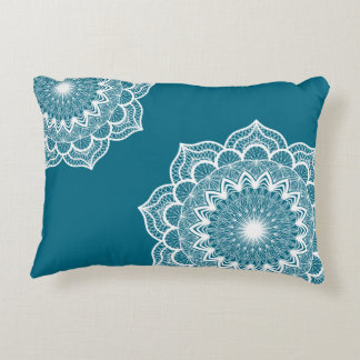 White mandala on blue background decorative cushion