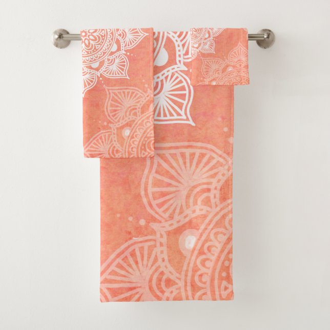 White mandalas on coral marble background bath towel set (Insitu)