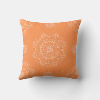 White Mandalas on Orange Cushion