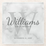 White Marble Classic Script Personalised Groomsmen Glass Coaster<br><div class="desc">Add a personal touch to your wedding with personalised groomsmen glass coaster. This coaster features personalised groomsman's name in grey classic script font style with wedding details in grey classic serif font style and monogram in light grey classic serif font style as background, on white marble background. Also perfect for...</div>
