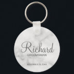 White Marble Modern Script Personalised Groomsman Key Ring<br><div class="desc">Personalised Groomsman Gifts featuring personalised groomsman's name in grey modern script font style with title and wedding date in modern sans serif font style on white marble background. Also perfect for best man, father of the bride, bridesmaid, maid of honour, mother of the bride and more. Please note: The marble...</div>