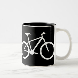 White mountain bike on black mug. Two-Tone coffee mug
