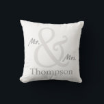 White Mr. and Mrs. Couple's Cushion<br><div class="desc">For the Mr. and Mrs., this Couple's pillow features an oversized ampersand with the couple's last name that you can personalise with your name. Shown here in white with matching grey and white stripes on the reverse side. You can change the stripes colour on by choosing the "customise it" button...</div>