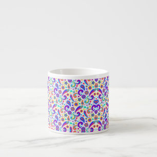 White mug with a vibrant paisley pattern 