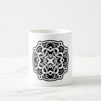 white mug with celtic design