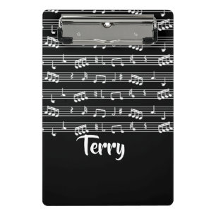 White musical notes on black mini clipboard