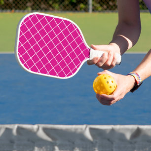 White net mesh on pink pickleball paddle