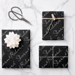 White on black script calligraphy names wedding wrapping paper sheet<br><div class="desc">Personalise your wedding with these elegant wrapping paper sheets featuring the couple's names in white script calligraphy on black. You can enter your names in the customisation field and adjust the text size as needed to fit the design. These wrapping paper sheets are perfect for adding a touch of class...</div>