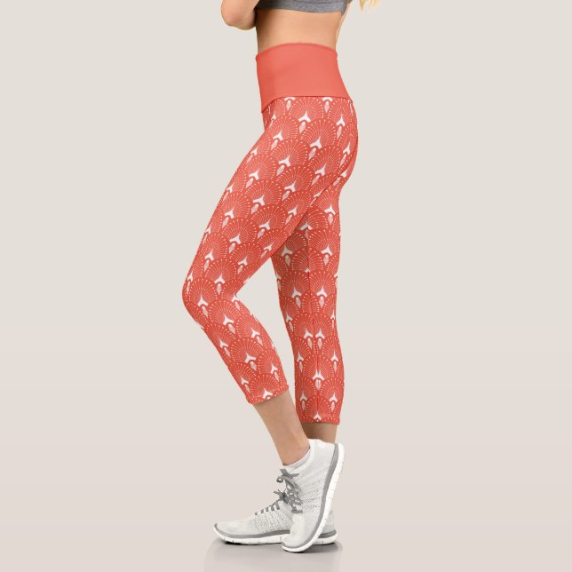 White on orange art-deco pattern capri leggings (Left)