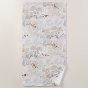 White orchids on a light cream  beach towel