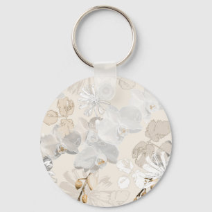 White orchids on a light cream   key ring