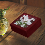 White Oriental Lily Bloom Floral Gift Box<br><div class="desc">Store trinkets, jewellery and other small keepsakes in this wooden gift box with ceramic tile that features a colourful photo image of the backside view of a white Oriental Lily bloom against the blurred background of a flaming red Burning Bush shrub. A stunning, floral design! Select your gift box size...</div>