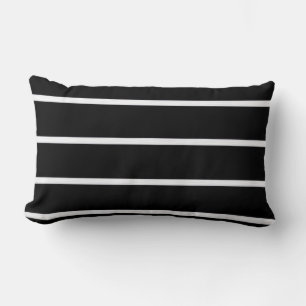 White painted stripes on black lumbar cushion