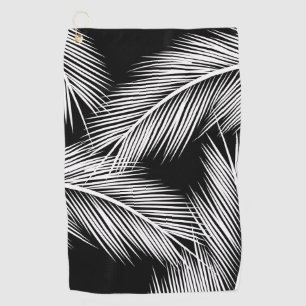 White palm leaves on black colour background golf towel