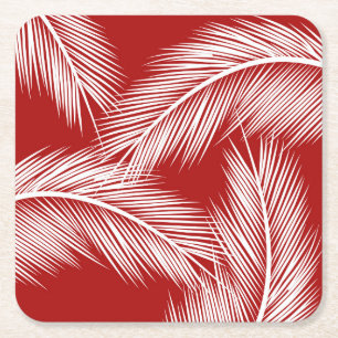 White palm leaves on red colour background square paper coaster