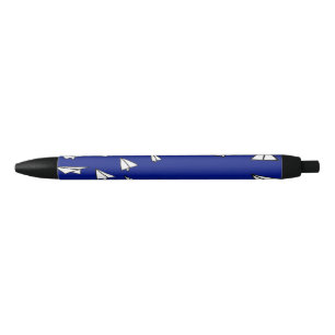 White paper planes on blue black ink pen