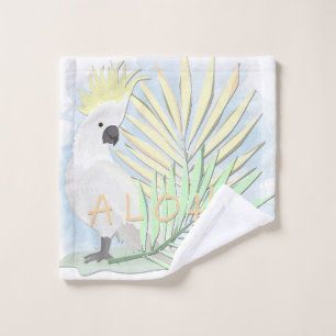 White parrot cockatoo in palm leaves. wash cloth