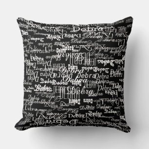 white pattern of names on black cushion