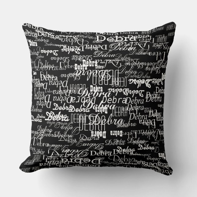 white pattern of names on black cushion (Front)