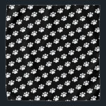 White Paw Print Pattern Bandana<br><div class="desc">Introducing our charming pattern of white paw prints on a black background, a design that captures the essence of your love for pets. This delightful pattern features a series of white paw prints arranged in a repeated pattern, creating a playful and eye-catching effect. Whether you're a proud pet owner, an...</div>