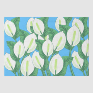 White peace lilies on pale blue background tissue paper