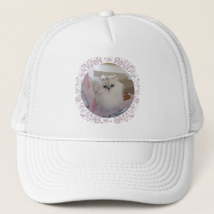 White Persian Cat on a Pink Chair Trucker Hat