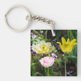 White, pink and yellow tulips in the garden key ring