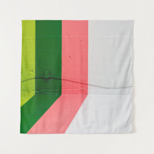White, pink, green, and yellow painted wall tapestry
