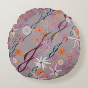 White, pink, orange flowers on grey round cushion